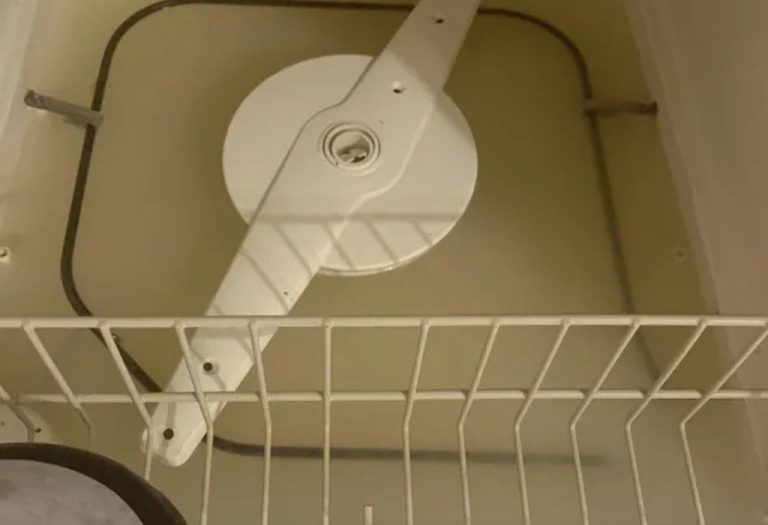 Why Is There Water in the Bottom of My Dishwasher? Causes & Fixes