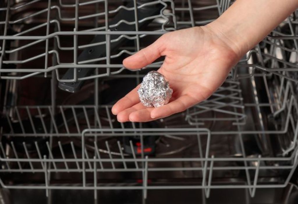 Why People Put Tin Foil In The Dishwasher