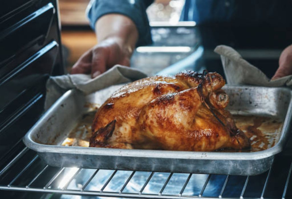 Cleaning and Maintaining the Oven After Roasting Chicken